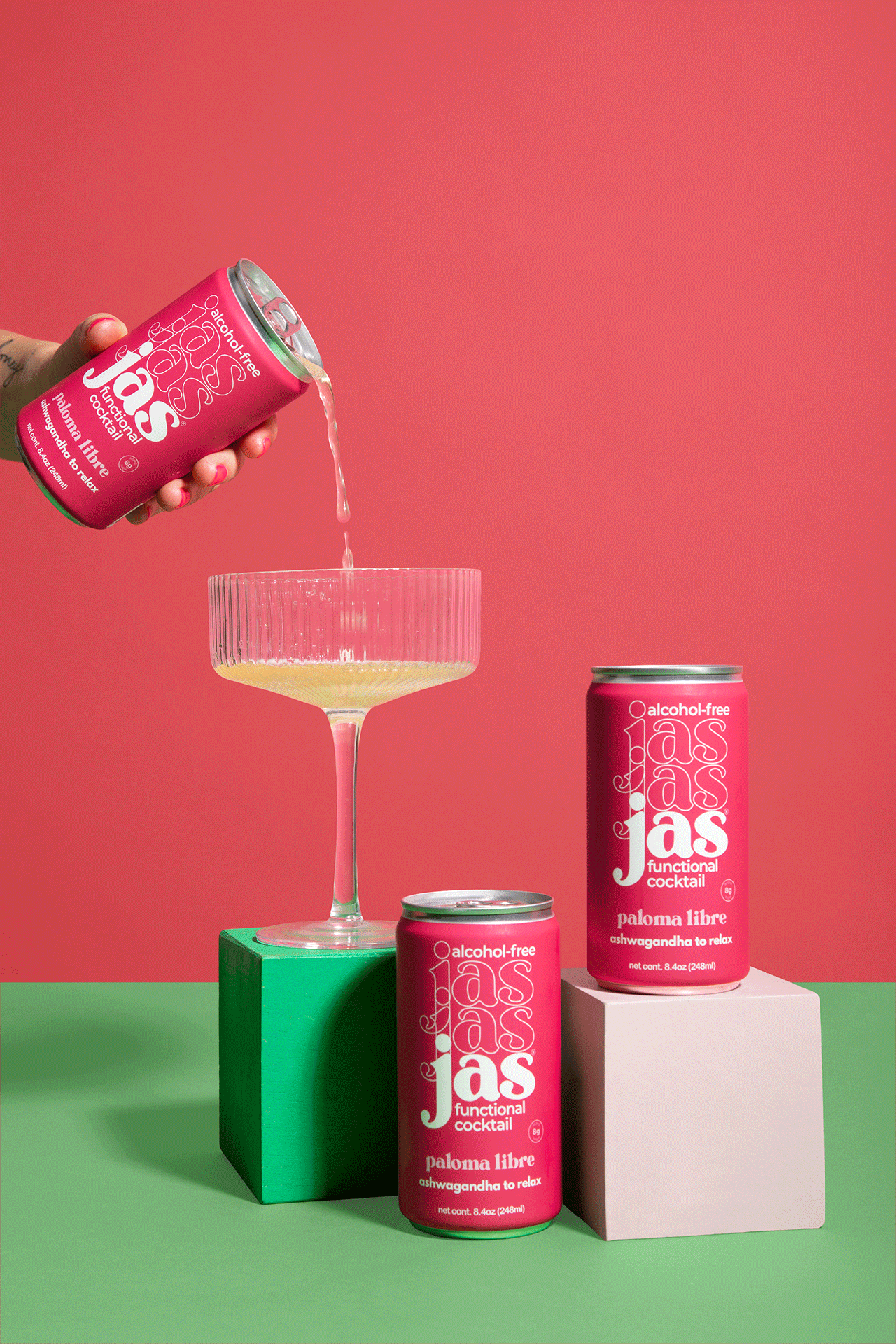 Pouring JAS Paloma Libre alcohol-free functional cocktail